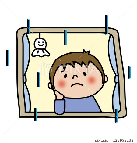 雨の日に困った顔で窓の外を見つめる子供（男の子） 123958132