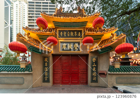 Beautiful entrance of Kun Yam Thong Temple in Kuala Lumpur adorned with traditional lanterns 123960876
