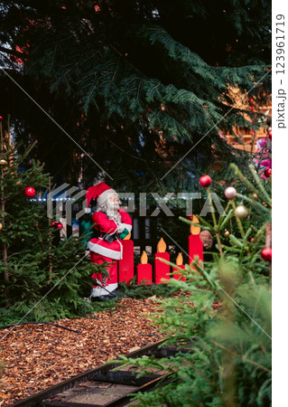 Green Christmas Train with Festive Decorations and Holiday Backdrop. High quality photo Green Christmas Train with Festive Decorations and Holiday Backdrop. High quality photo 123961719