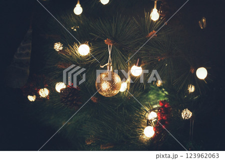 Christmas Tree with Book and Nativity Scene Festive Holiday Decorations and Cozy Seasonal Atmosphere. High quality photo Christmas Tree with Book and Nativity Scene Festive Holiday Decorations and Cozy Seasonal Atmosphere. High quality photo 123962063
