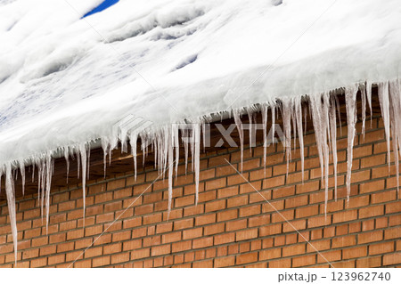 Icicles on the roof Icicles on the roof 123962740