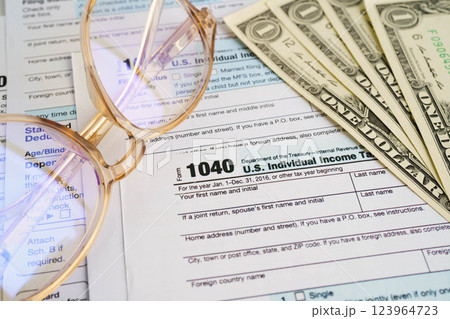 Tax form 1040 U.S. Individual Income Tax Return, business finance concept. 123964723