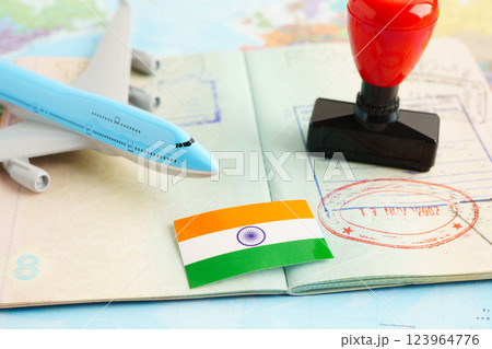 India passport with approved stamp on document for tourism to immigration at airport in country. 123964776