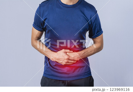 person with stomach pain, stomach problems concept, man with digestive problems, man with stomach pain, isolated 123969116