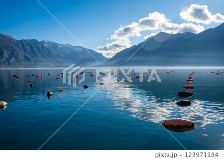 Panoramic view of Kotor Bay with oyster farms in winter morning, Montenegro Panoramic view of Kotor Bay with oyster farms in winter morning, Montenegro 123971184