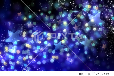 星が輝く青色のキラキラ背景　イルミネーション　玉ボケ　光 123973561
