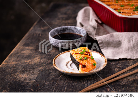 Baked sushi roll cake with crab surimi sticks 123974596