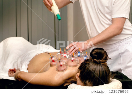 Professional massage therapist 123976995