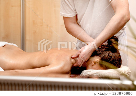 Professional massage therapist 123976996