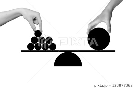 Business concept of balance. Hand holding scale symbolizing stability, equality, and financial Business concept of balance. Hand holding scale symbolizing stability, equality, and financial 123977368