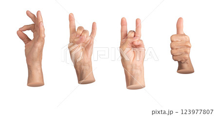 An elderly woman showing a hand gesture. Fingers in OK sign, with thumb up, and other hand making a An elderly woman showing a hand gesture. Fingers in OK sign, with thumb up, and other hand making a 123977807