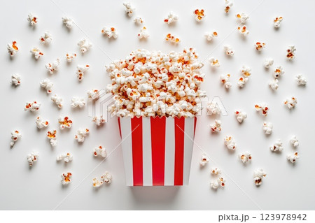 Close-up of a popcorn-filled paper box isolated on white Close-up of a popcorn-filled paper box isolated on white 123978942