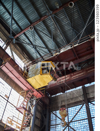 Industrial crane cabin inside factory Industrial crane cabin inside factory 123980399