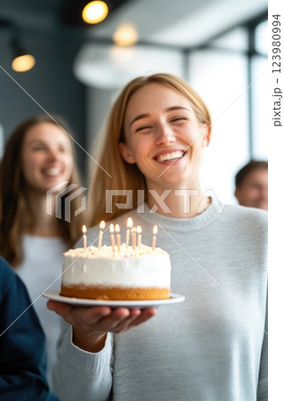 Celebrating Office Birthday with Cake and Smiles 123980994