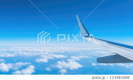 Clear skies and airplane contrails in flight Clear skies and airplane contrails in flight 123981606
