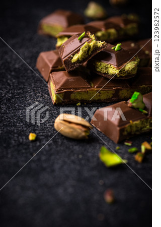 Dubai chocolate with kadayif pistachio filling 123982572