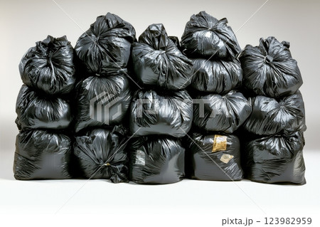 Efficiently Stacked Black Garbage Bags for Effective Waste Management and Disposal Solutions Efficiently Stacked Black Garbage Bags for Effective Waste Management and Disposal Solutions 123982959