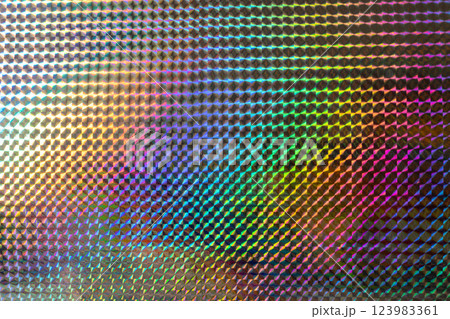 A vibrant, iridescent pattern of diamond shapes reflecting various colors, creating a mesmerizing visual effect reminiscent of art and design. 123983361