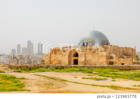 The Dome of Umayyad Palace mosque with city skyline in the background, Citadel Hill, Jabal al-Qala, Amman, Jordan. 123983778