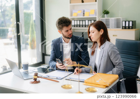 Modern lawyer office a professional discussion, legal documents, and teamwork. Perfect 123990066
