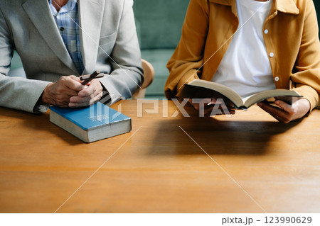 Christians are congregants join hands to pray and seek the blessings Christians are congregants join hands to pray and seek the blessings 123990629