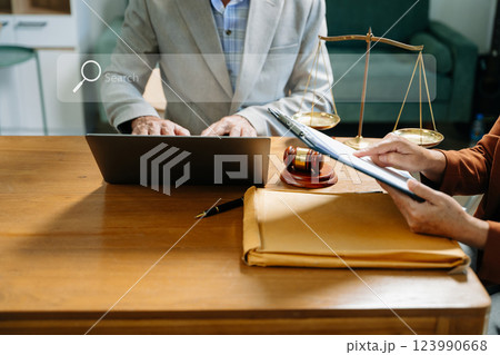 Business and lawyers discussing contract papers with blank search bar.justice and law concept.Male judge 123990668
