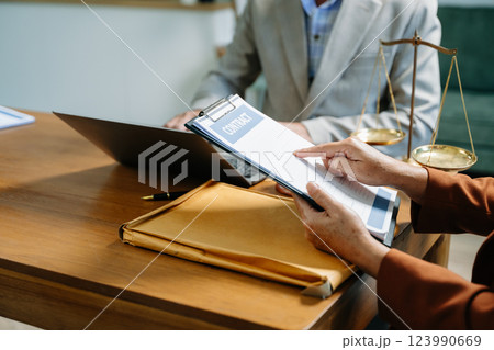Business and Male lawyer or judge consult having team meeting with client, Law and Legal services Business and Male lawyer or judge consult having team meeting with client, Law and Legal services 123990669