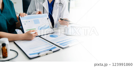 Medical technology network team meeting concept. Doctor hand working with smart phone modern digital tablet Medical technology network team meeting concept. Doctor hand working with smart phone modern digital tablet 123991860
