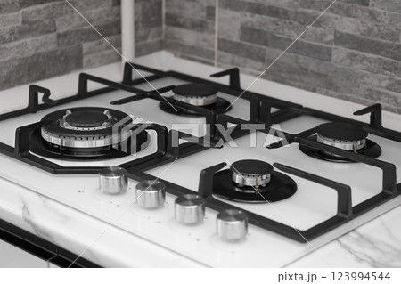 white gas stove close up 123994544