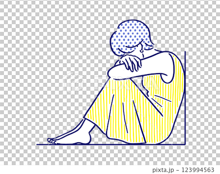 膝を抱えてうずくまる落ち込んだ女性 123994563