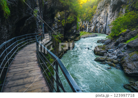 Winding narrow footbridge in the Aare gorge, Meiringen, Switzerland Winding narrow footbridge in the Aare gorge, Meiringen, Switzerland 123997718