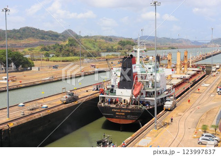 Ship crossing Panama Canal at Miraflores Locks - Panama City, Panama Ship crossing Panama Canal at Miraflores Locks - Panama City, Panama 123997837