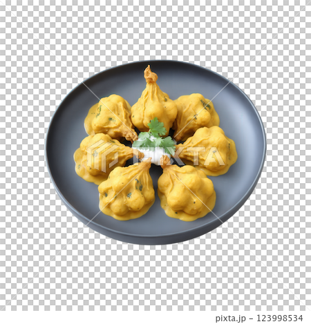 Kadhi Pakora - A traditional dish made with fried gram flour dumplings (pakoras) soaked in a tangy yogurt-based gravy spiced 123998534