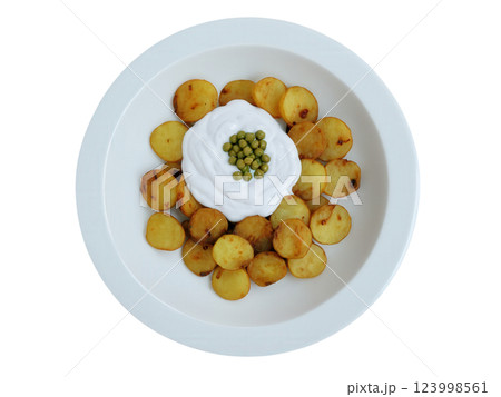 Potato Chaat A spicy, tangy Indian street food made with crispy fried potatoes, topped with yogurt, tamarind chutney, and chickpeas. 123998561