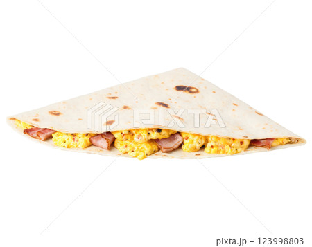 Breakfast Quesadilla Flour tortilla stuffed with scrambled eggs, cheese, and sausage or bacon, then grilled until crispy. 123998803