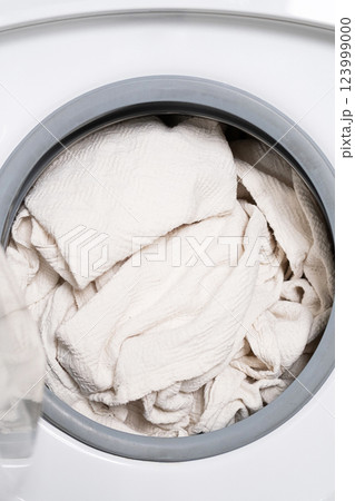 White Clothes Into Washing Machine. 123999000