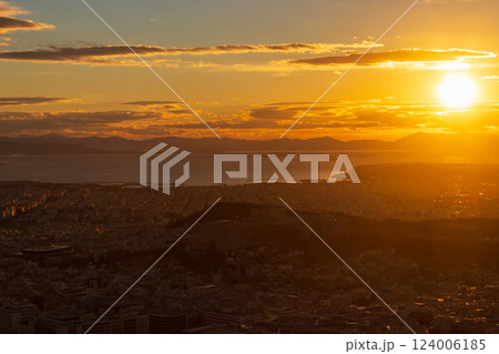 A breathtaking view of the sunset over the city of Athens, Greece from the top of the Lycabettus hill 124006185