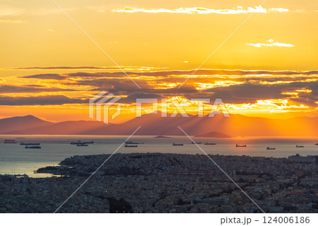 A breathtaking view of the sunset over the city of Athens, Greece from the top of the Lycabettus hill 124006186