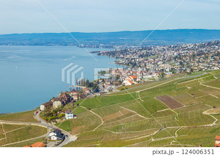 View of the famous Lavaux terraced vineyards, lake Geneva and the Alps in canton Vaud, Switzerland View of the famous Lavaux terraced vineyards, lake Geneva and the Alps in canton Vaud, Switzerland 124006351