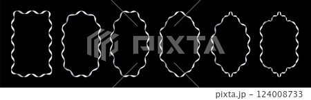 Set of exquisite silver frames with wavy lines and patterns. Fashionable vintage ornate frames for wedding invitations, greeting cards, prints. 124008733
