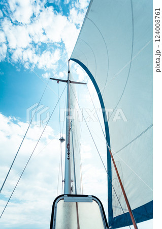 Detailed closeup of sail on sailboat Detailed closeup of sail on sailboat 124008761