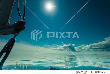 Yachting on sail boat during sunny weather 124008772