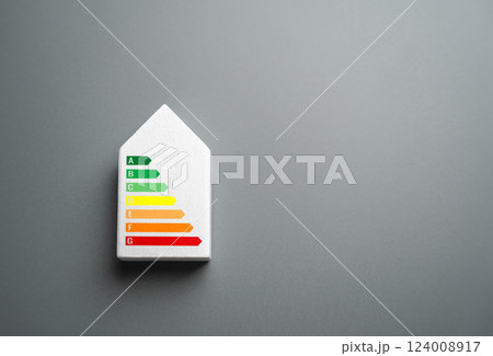 Energy efficiency scale on the house. The concept of household energy efficiency. Insulation quality, heating system. Reduce electricity consumption. Improve sustainability, lower utility costs. 124008917