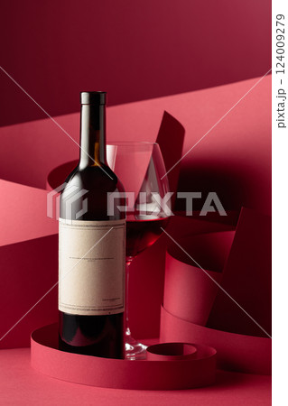 Bottle and glass of red wine. Bottle and glass of red wine. 124009279