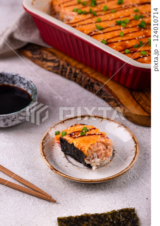 Baked sushi roll cake with crab surimi sticks Baked sushi roll cake with crab surimi sticks 124010714