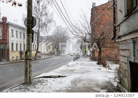 view of street in Kostroma city during snowfall 124013307