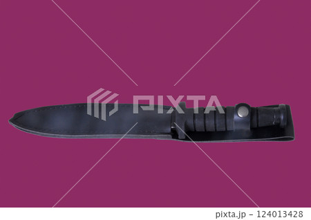 Dagger isolated over a Burgundy background Dagger isolated over a Burgundy background 124013428
