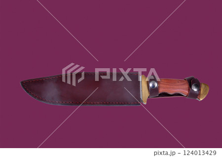 Bowie Knife in scabbard isolate over Burgundy 124013429