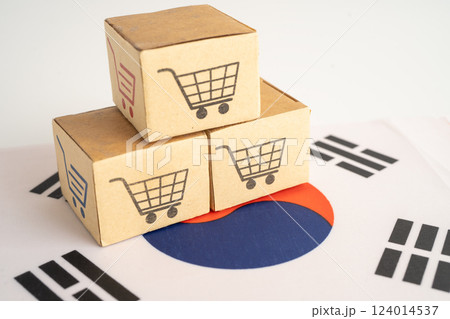South Korea shopping, Shopping cart box on Venezuala flag, import export, finance commerce. South Korea shopping, Shopping cart box on Venezuala flag, import export, finance commerce. 124014537