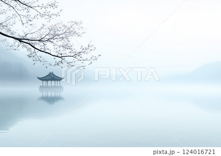 A small wooden boat is floating on a lake A small wooden boat is floating on a lake 124016721